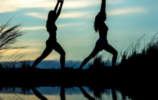 Two Women Doing Yoga